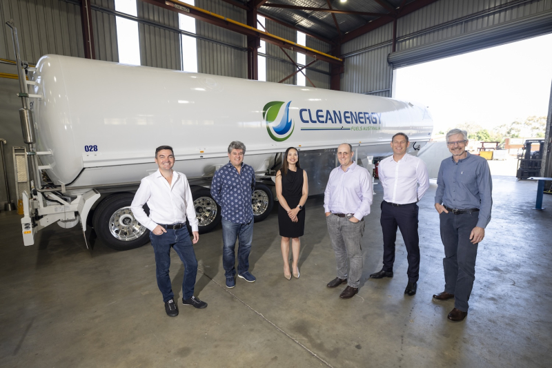 Clean Energy Australia and Ledge Finance teams standing in front of a white Clean Energy tanker in a warehouse