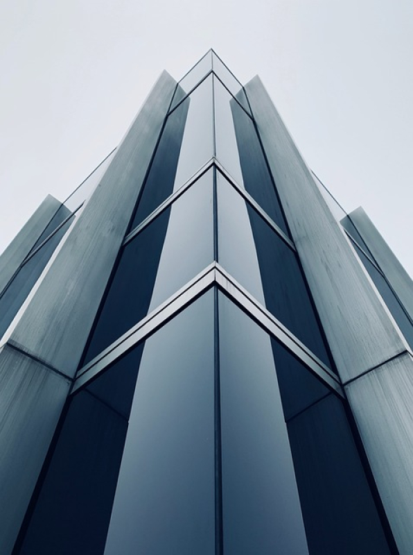 Tall grey office building
